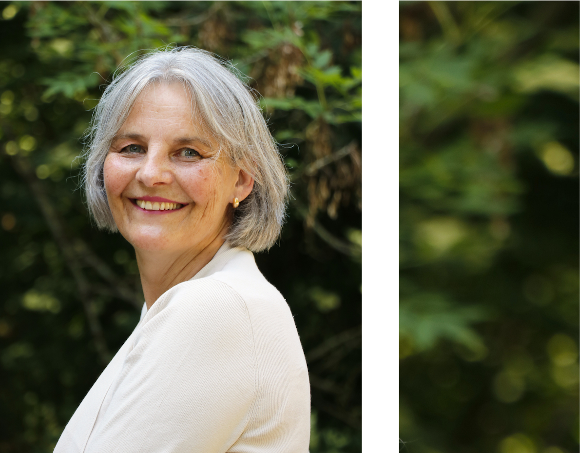 Energetikerin Christine Gningue lächelt einladend für ganzheitliche Energiearbeit im Freien.